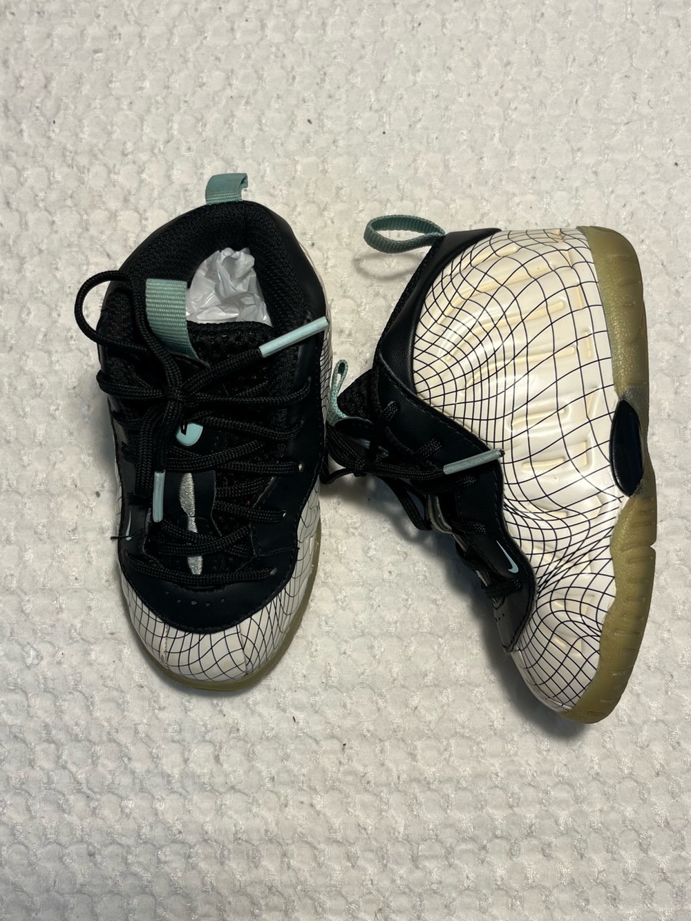 Nike Baby Black and White Grid Wrapped Sneakers with Teal Accents